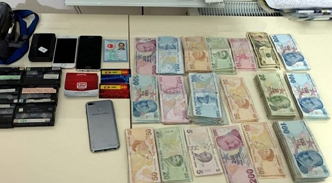 İzmir'de FETÖ'nün hücre evlerine operasyon: 74 gözaltı.