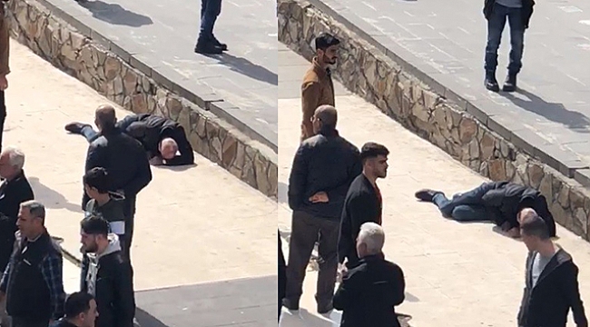 Yere yığılan şahsa, virüs endişesiyle kimse müdahale edemedi.