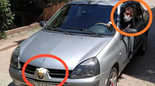 Salgının bizi getirdiği son seviye: Vatandaş aracına maske taktı.