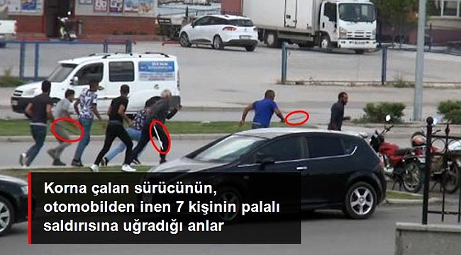 Kamyonet sürücüsünün korna çaldığı otomobildeki 7 kişinin palalı demir sopalı saldırısına uğradığı anlar kamerada.