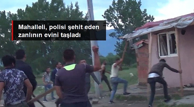 Polisi şehit eden zanlının evi taşlandı.