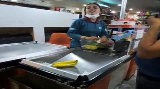 Korona neden bitmiyor? Uyarıya rağmen maskesini kapatmayan kasiyerin umursamaz tavırları kamerada.