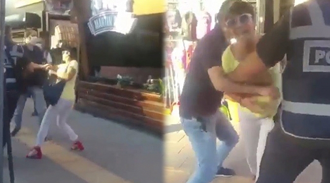 Maske takmamak için polise direnen kadına hemcinsinden görülmemiş tepki....
