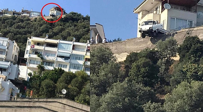 Yoldan çıkan kamyonet uçurumda askıda kaldı.