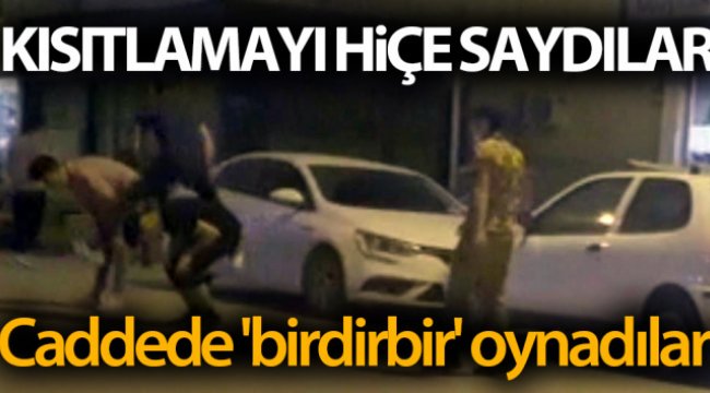 Sokağa çıkma kısıtlamasında caddede 'birdirbir' oynadılar