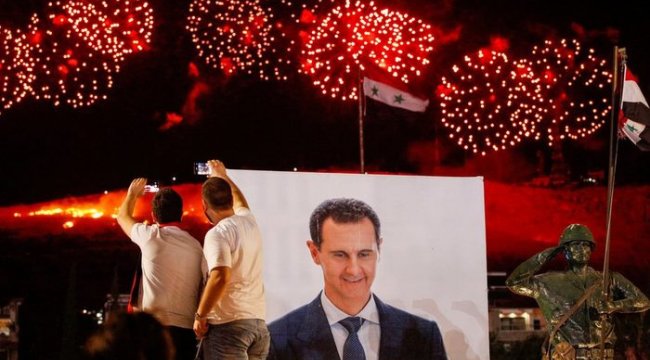 Suriye&#039;de devlet başkanlığı seçimlerini oyların %95,1&#039;ini alan Beşar Esad kazandı, muhalefet seçimler için &#039;saçmalık&#039; dedi