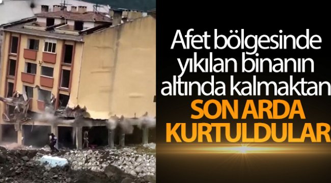 Afet bölgesinde yıkılan binanın altında kalmaktan son arda kurtuldular