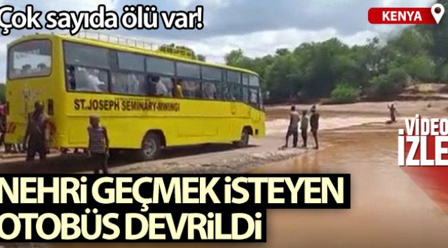 Kenya’da taşan nehri geçmek isteyen otobüs devrildi
