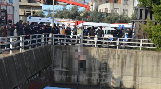 Nehirde bulunan ceset vinçle çıkarıldı