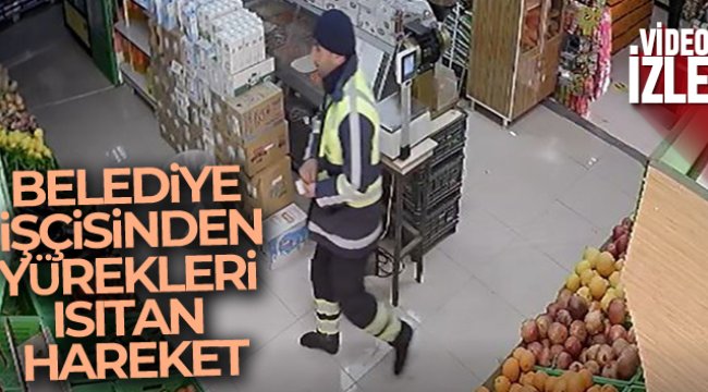 Çamurlu ayakkabılarını çıkarıp markete çorabıyla girdi
