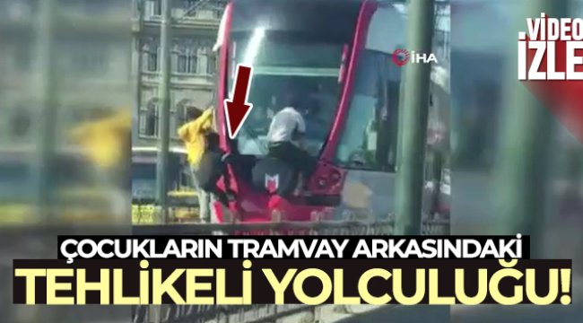 Çocukların tramvay arkasındaki tehlikeli yolculuğu kamerada