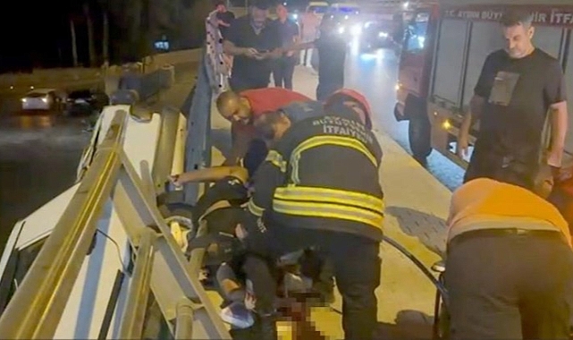 Aydın'da feci kaza! Uçurumda asılı kalan araçtan fırladı, vücuduna demir korkuluk saplandı