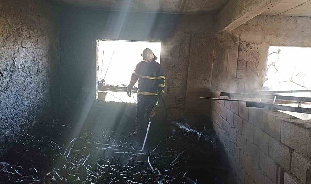 Hatay Hassa'da üç katlı binanın zemin katında yangın çıktı
