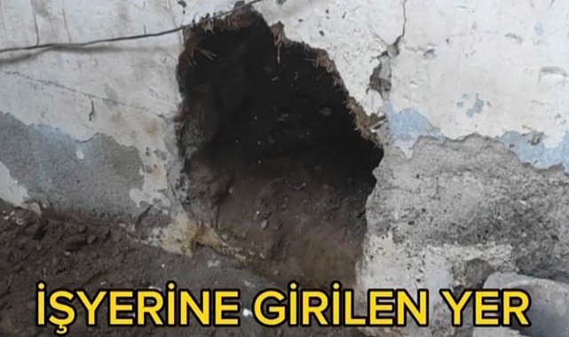 Duvarı delip, 1 milyon liralık cep telefonu çalan 2 hırsız yakalandı