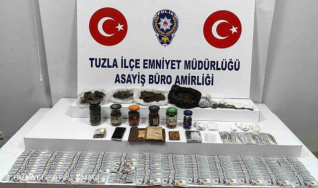 Tuzla'da yakalanan zehir tacirinin evinden farklı ülkelere ait nakit para çıktı
