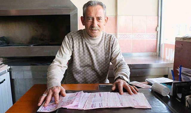 ATM'de bulduğu 19 bin 800 lirayı görevlilere teslim etti