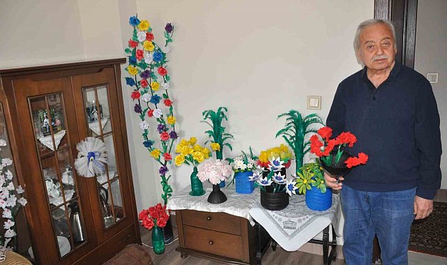 Geri dönüşüm malzemeleriyle evini adeta çiçek bahçesine çevirdi