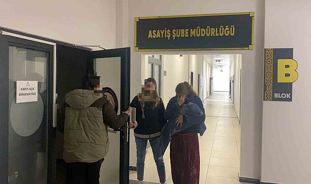 Kucağında çocuğuyla adliyeye sevk edildi