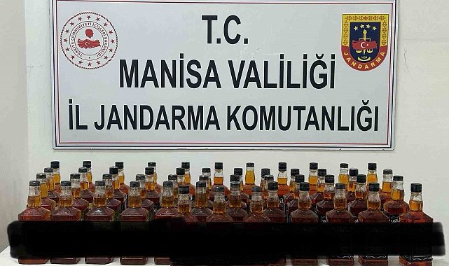 Manisa'da bir araç içerisinde 50 litre kaçak viski ele geçirildi