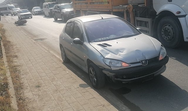 Otomobille çarpışan motosiklet sürücüsü yaralandı