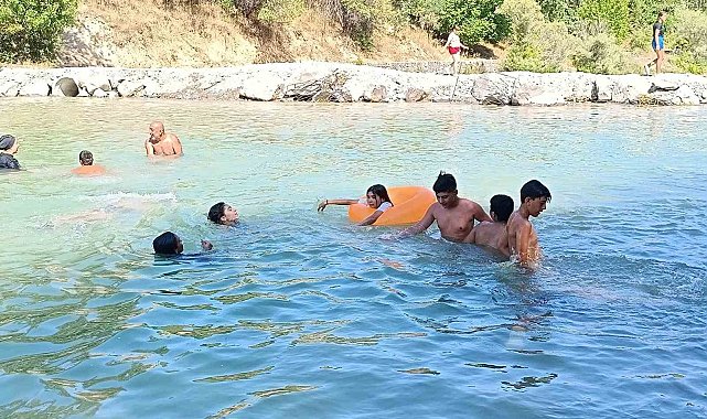 Termometreler 33 dereceyi gösterdi, sıcaktan bunalanlar Tağar Çayı'na akın etti