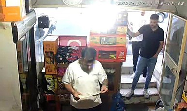 Ümraniye'de dükkanlardan vergi levhası parası isteyen şahıslar yakalandı