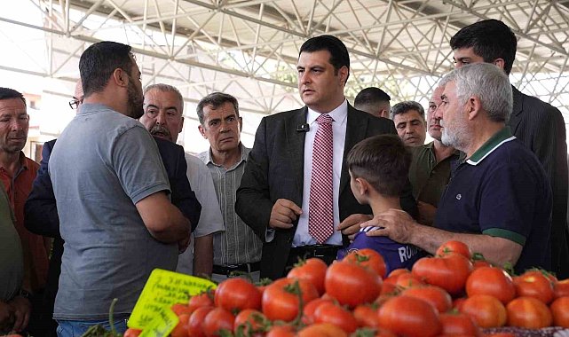 Yılmaz, pazarcı esnafıyla bir araya geldi