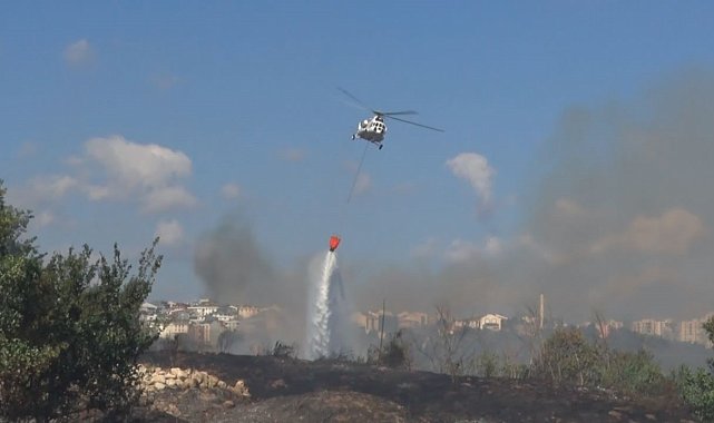 Avcılar'da otluk alanda çıkan yangın helikopter yardımıyla söndürüldü