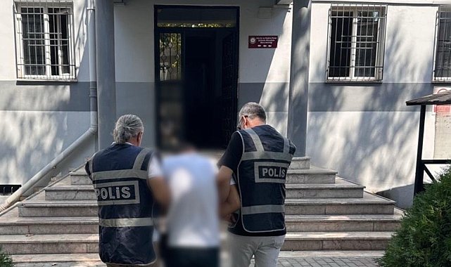 Bursa'da azılı dolandırıcı, parkta otururken yakalandı