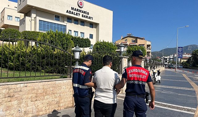 Kadın şüpheli erkek kılığında yakalandı