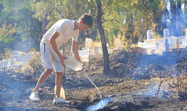 Orman yangınında 12 yaşındaki Eymen'den alkışlanacak hareket