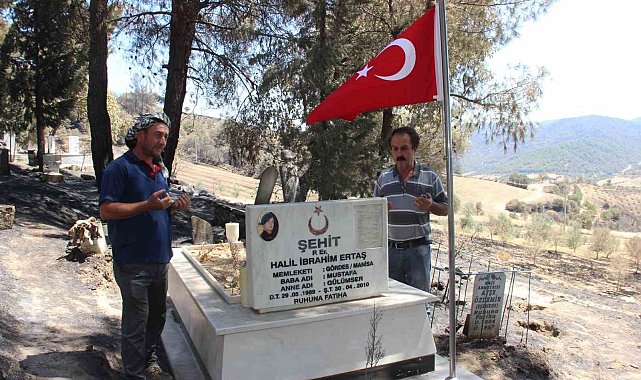 Yangında şehit mezarı yanmadı