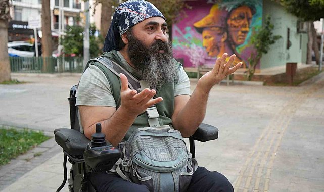 Bedensel engelli adamın &#039;rampa&#039; çilesi