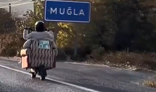 Scooter'a yerleştirdiği koltukla trafiğe çıktı